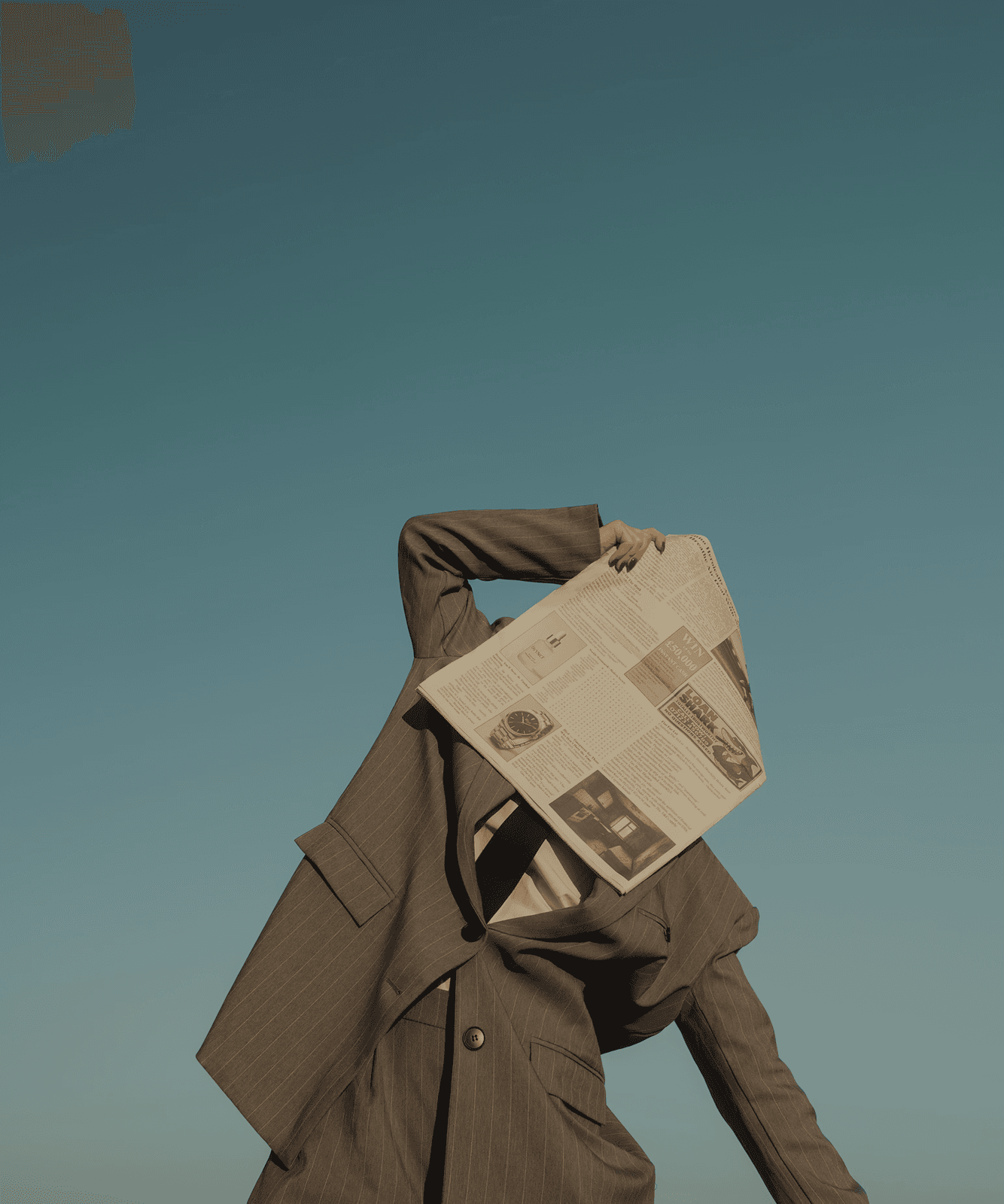 Person reading a newspaper